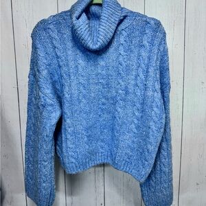 Blue cable knit sweater
